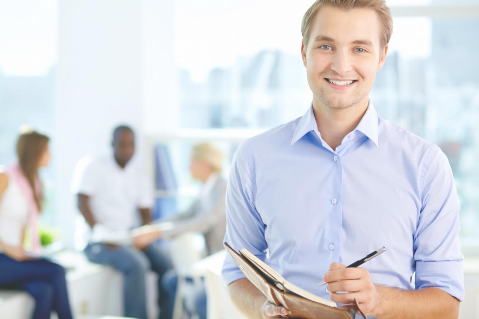 Close-up of hands organizing financial documents and bills on a desk, illustrating the process of taking control of finances